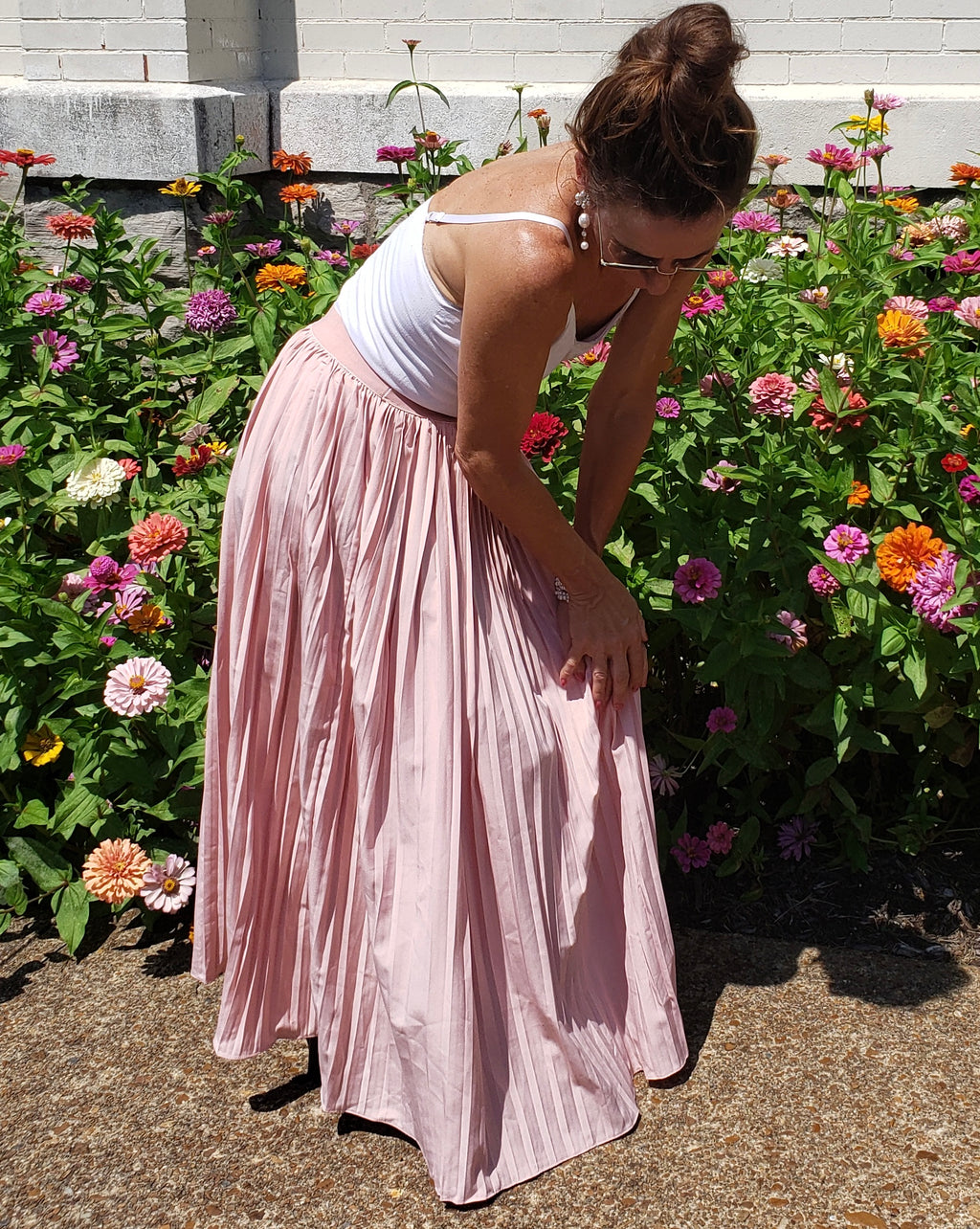 Suitcase ready withy pretty in pink pleats. Flow from business to leisure.