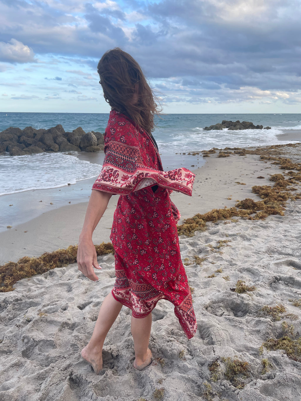 Kicking it up with red & slight ruffles from the plane, to business, a wedding  to the beach